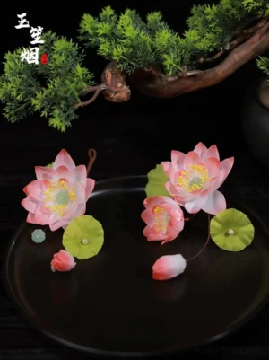 Traditional Chinese lotus hair accessories with pink open blossoms lotus buds green leaves and decorative beads for Hanfu hairstyles