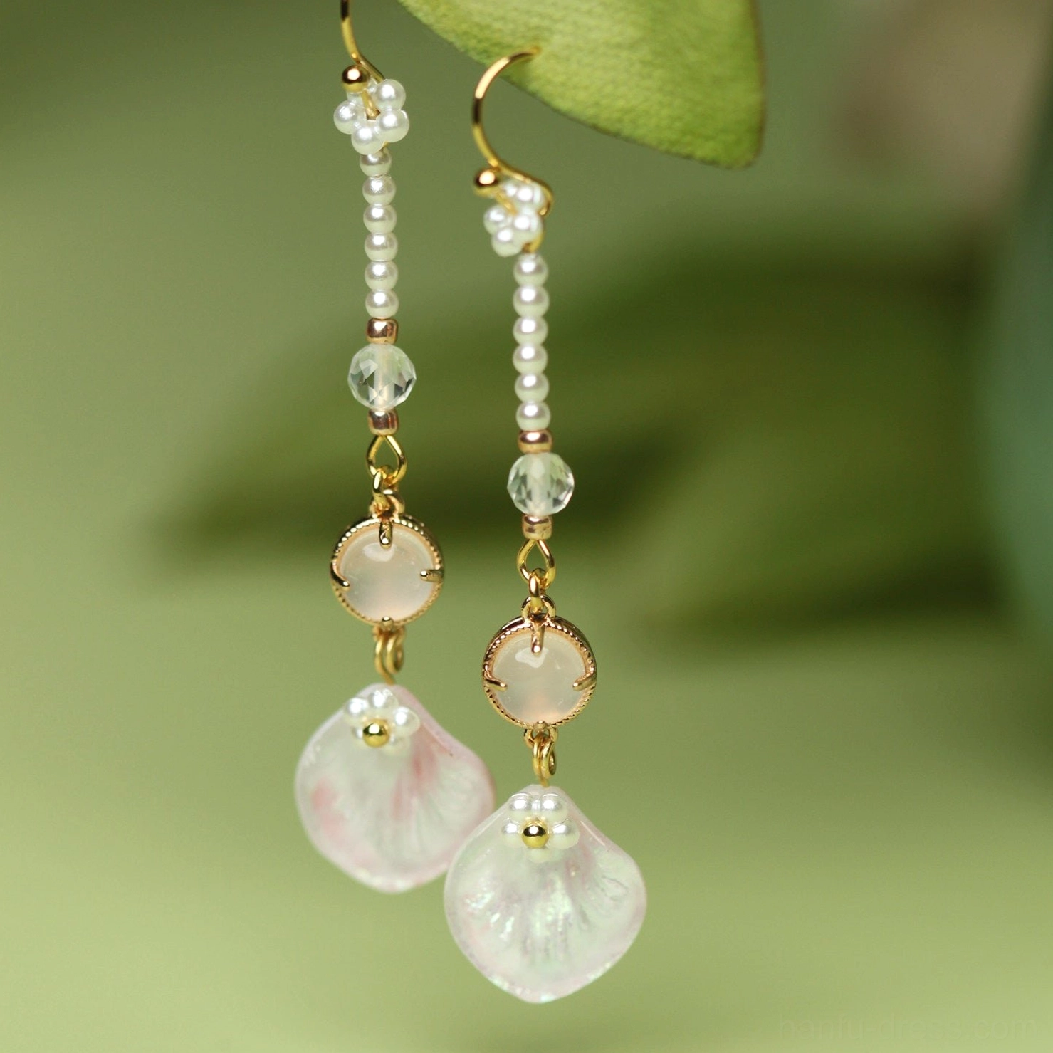 Hook style pink petal Chinese earrings with layered pearl bead chains gold framed pink charms and iridescent flower petal pendants