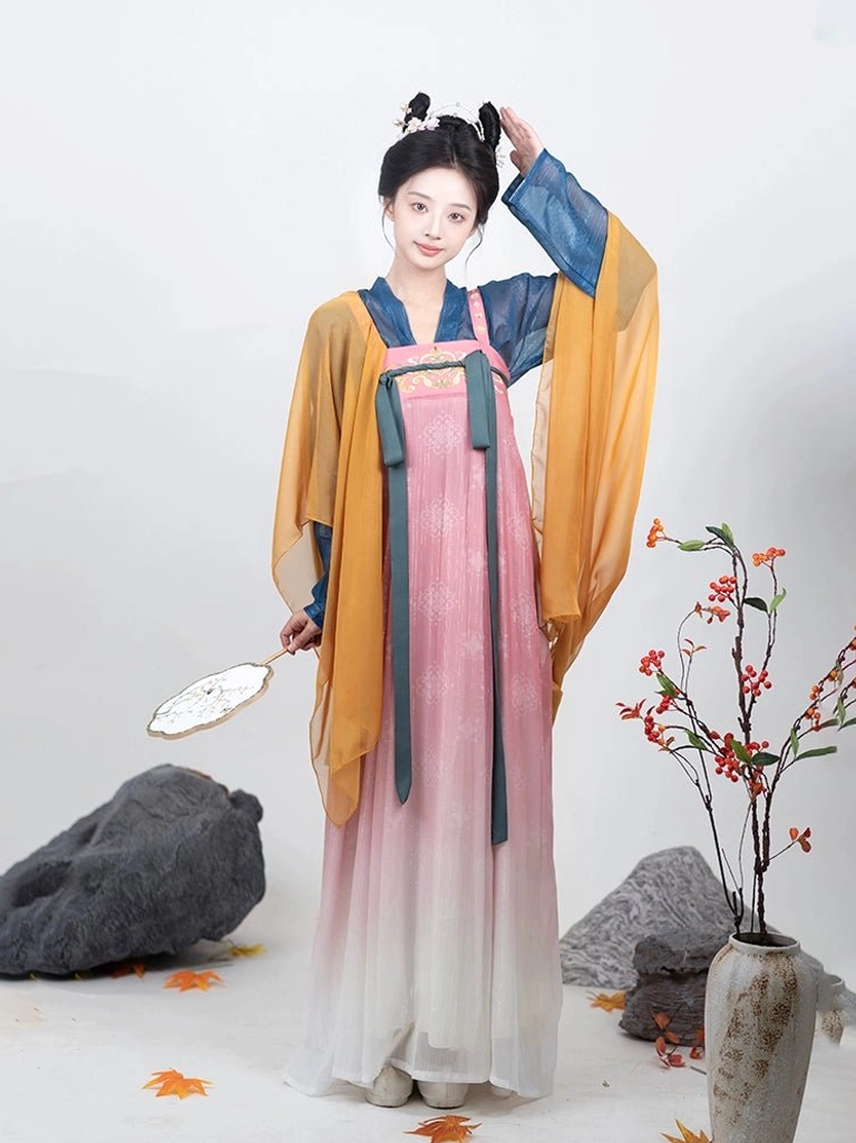 Front view of pink Tang Dynasty Qixiong Ruqun Hanfu with ivory gradient skirt dark green chest ribbons and yellow sheer shawl