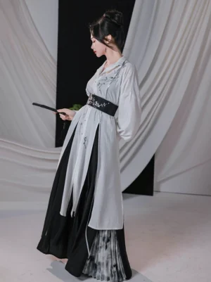 Plum Blossom Lyrics white embroidered Hanfu robe and black wide-leg pants full outfit side view with folding fan