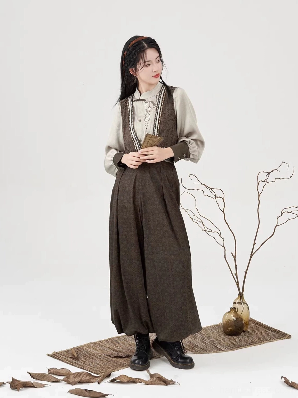 Full-body front view of the Poetry of the Wilderness modern Hanfu three-piece outfit with embroidered brown vest, cream blouse, and lantern pants