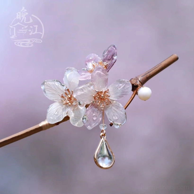 Side view of Polar Night traditional Chinese hair stick featuring translucent cherry blossom petals, rose-gold-tone centers and sparkling teardrop pendant