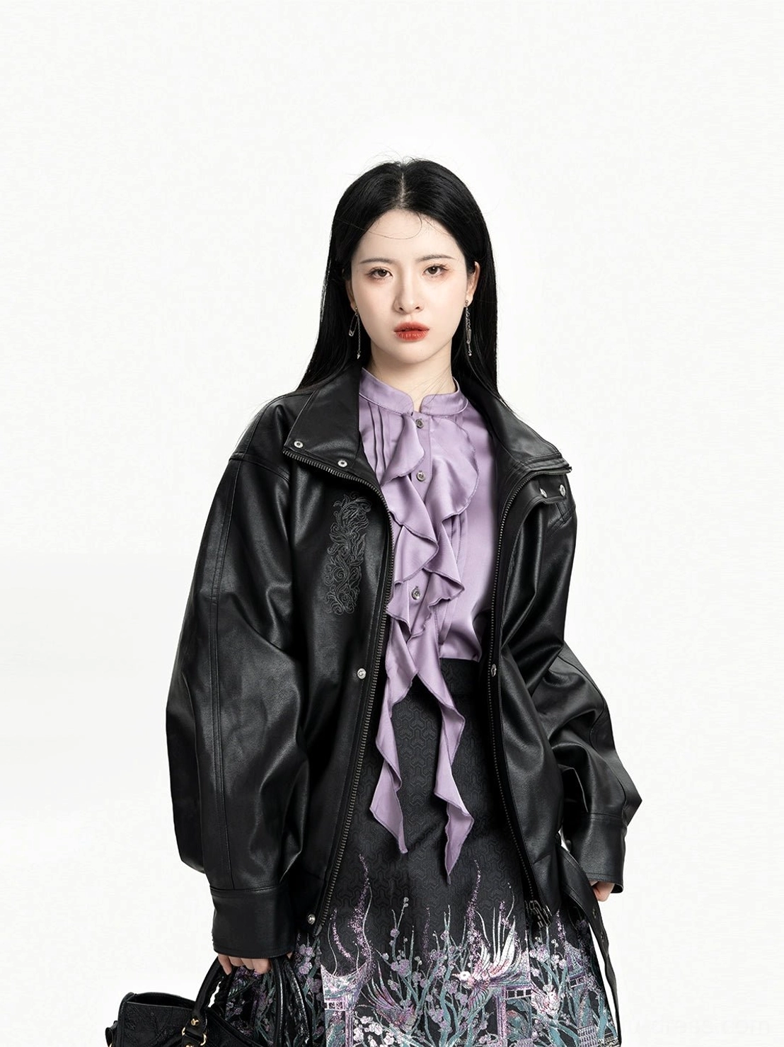 Close-up of lavender satin ruffle Chinese blouse and black faux leather coat from Polar Night mini mamian skirt outfit