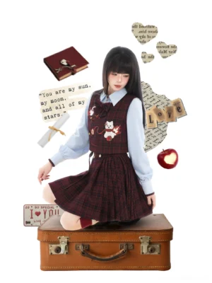 Full front view of a preppy Chinese Hanfu outfit featuring removable bow tie, cropped plaid vest, light blue shirt, and wine red high waisted mamianqun skirt
