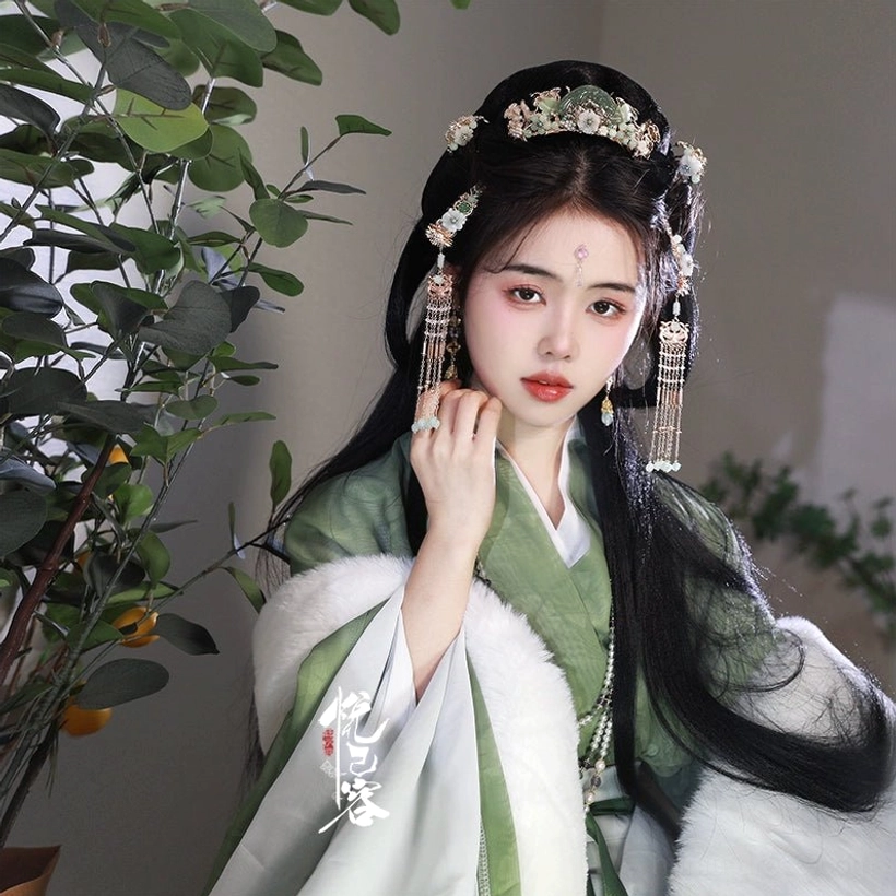 Model wearing a complete Pretty Song Hanfu hair accessories set with green Hanfu, decorative crown, matching hair combs, and long jade-inspired tassel hairpins