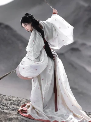 Side back view of Qin Han Dynasty inspired white straight hem Hanfu robe with red sash, wide sleeves, red hem border and flowing train