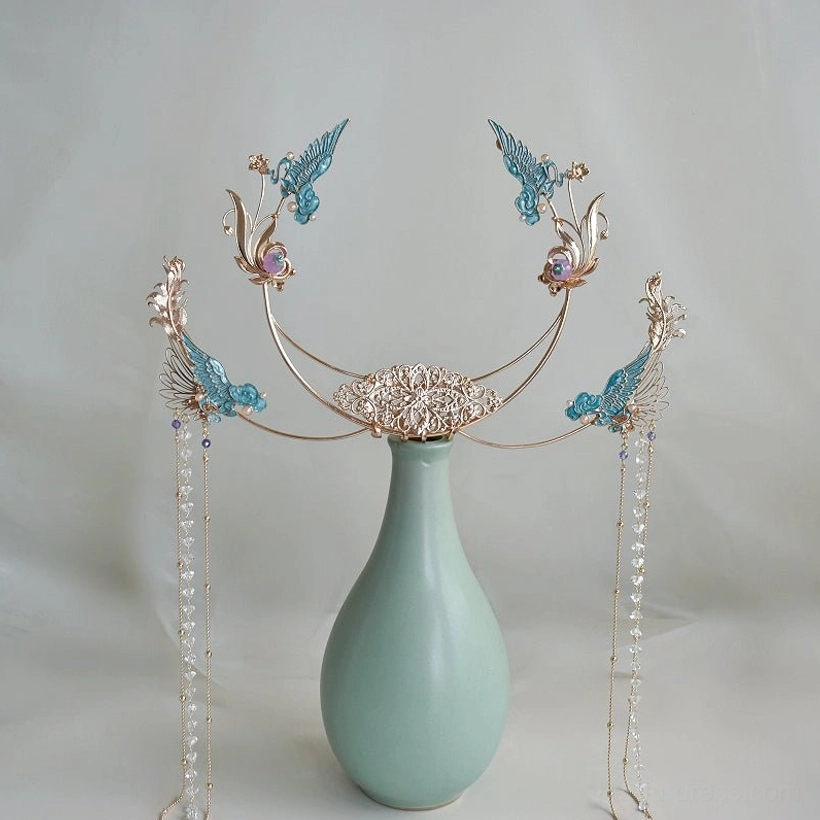 Purple Dunhuang Hanfu crown component shown from a three-quarter side angle, featuring a gilded metal frame, blue phoenix ornaments, central decorative plaque, and long crystal bead tassels