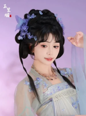 Purple iris butterfly Hanfu hair pins worn by model in light green traditional Chinese Hanfu against a purple studio background