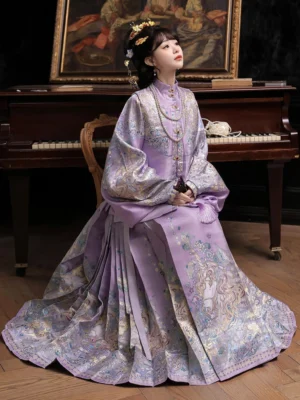 Purple Ming Dynasty Hanfu set with embroidered pipa sleeve top and flowing mamian skirt styled on a seated model in a vintage indoor piano studio
