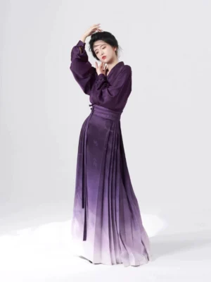 Purple ombre Ming Dynasty Hanfu mamianqun outfit shown in a full side-front studio view with leaf jacquard skirt