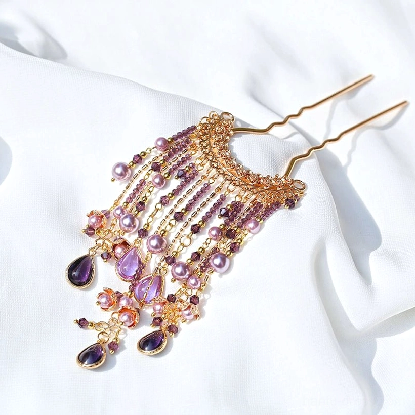 Front view of a purple and pink pearl U-shaped Chinese hairpin with dark purple teardrop pendants and cascading metal chain tassels