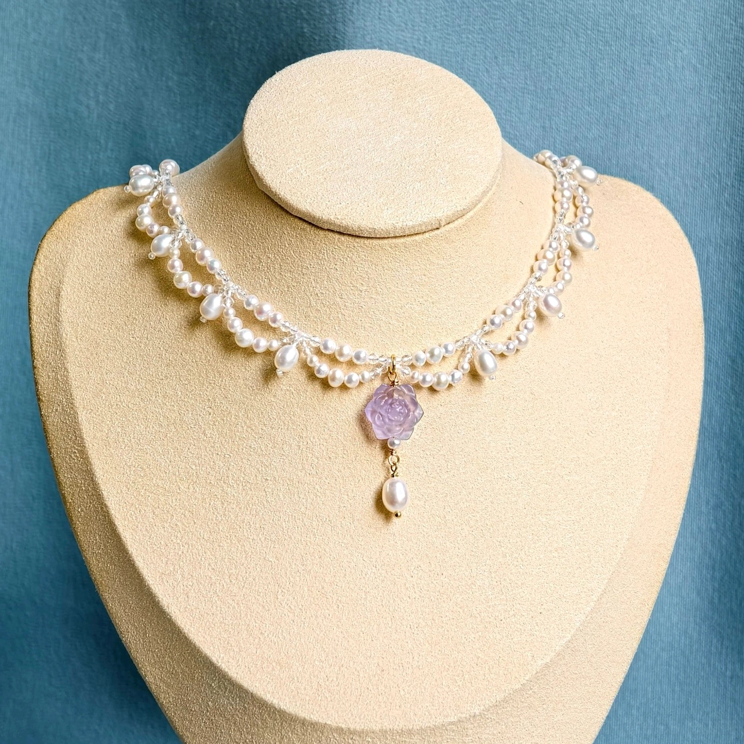Purple carved rose freshwater pearl Chinese necklace and Hanfu choker with elegant teardrop pearl pendant on mannequin