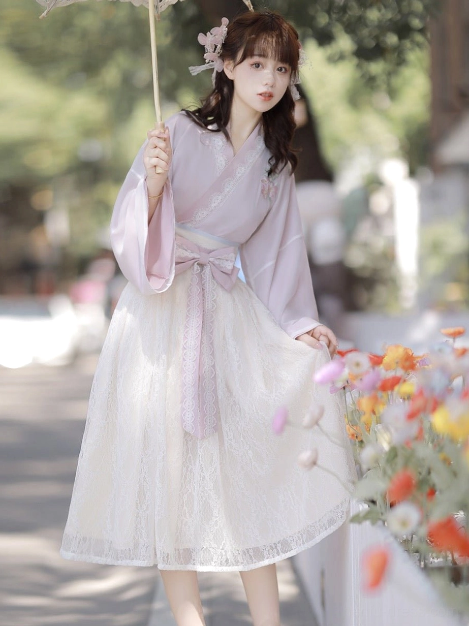 Purple Song-inspired modern Chinese Hanfu dress with flowing wide sleeves, lace trim and coordinated waist bow side view