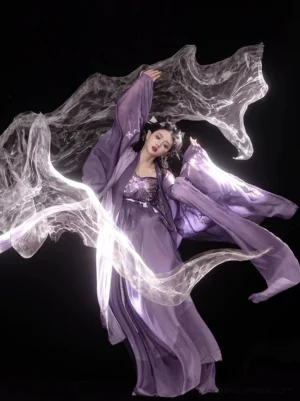 Dynamic three-quarter view of a purple Tang Dynasty Hanfu Heziqun dress with delicate chest embroidery, lightweight chiffon layers, wide sleeves, and graceful flowing movement