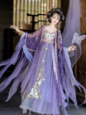 Purple Tang Dynasty Hanfu Heziqun dress set with golden floral embroidery, wide flowing sleeves, pearl skirt trim, and ancient Chinese hair accessories