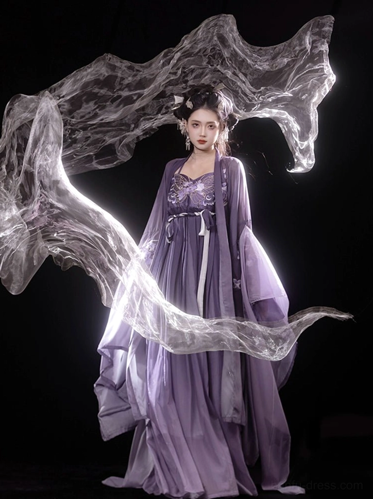 Upper-body close-up of a purple Tang-style Hanfu Heziqun dress featuring an off-shoulder embroidered bustier, flowing outer robe, and coordinated dusty purple color