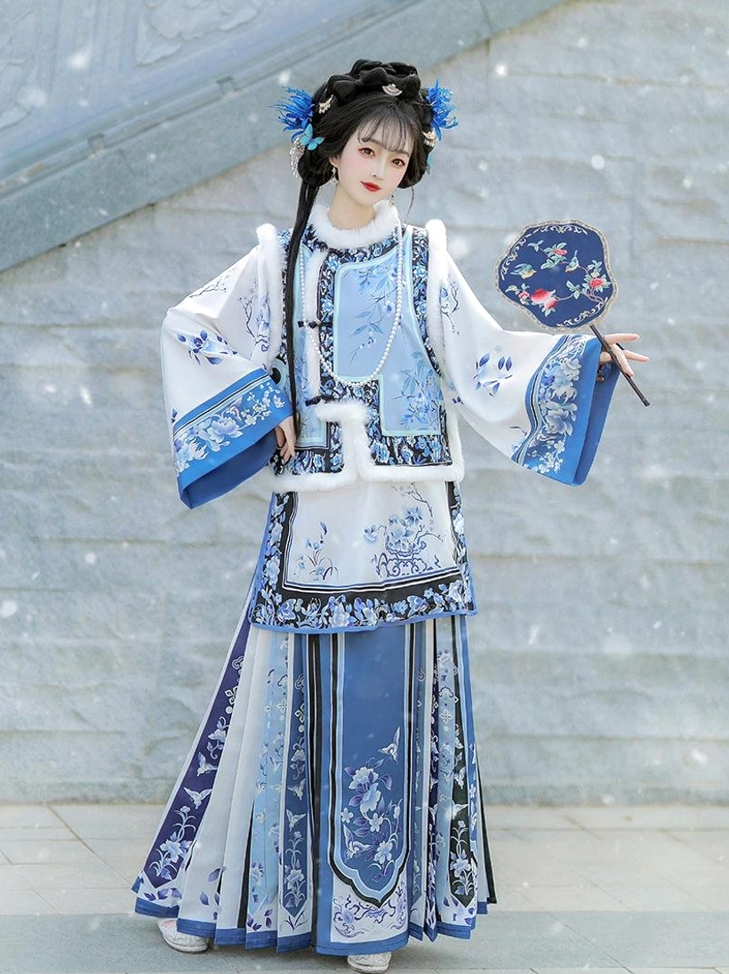 Blue white porcelain style Qing Dynasty Han women winter outfit with floral embroidery layered skirt fur style collar trim and matching round fan