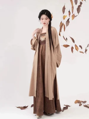 Front view of Qiuju Tang Dynasty Hanfu set with golden chrysanthemum embroidery and flowing floor length slip dress