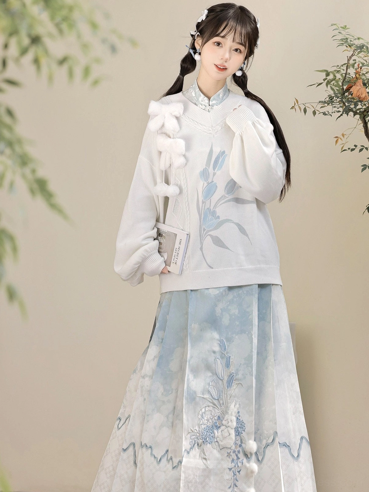 Relaxed fit white Neo Chinese Hanfu sweater paired with a dreamy blue Ming inspired Mamianqun horse face skirt