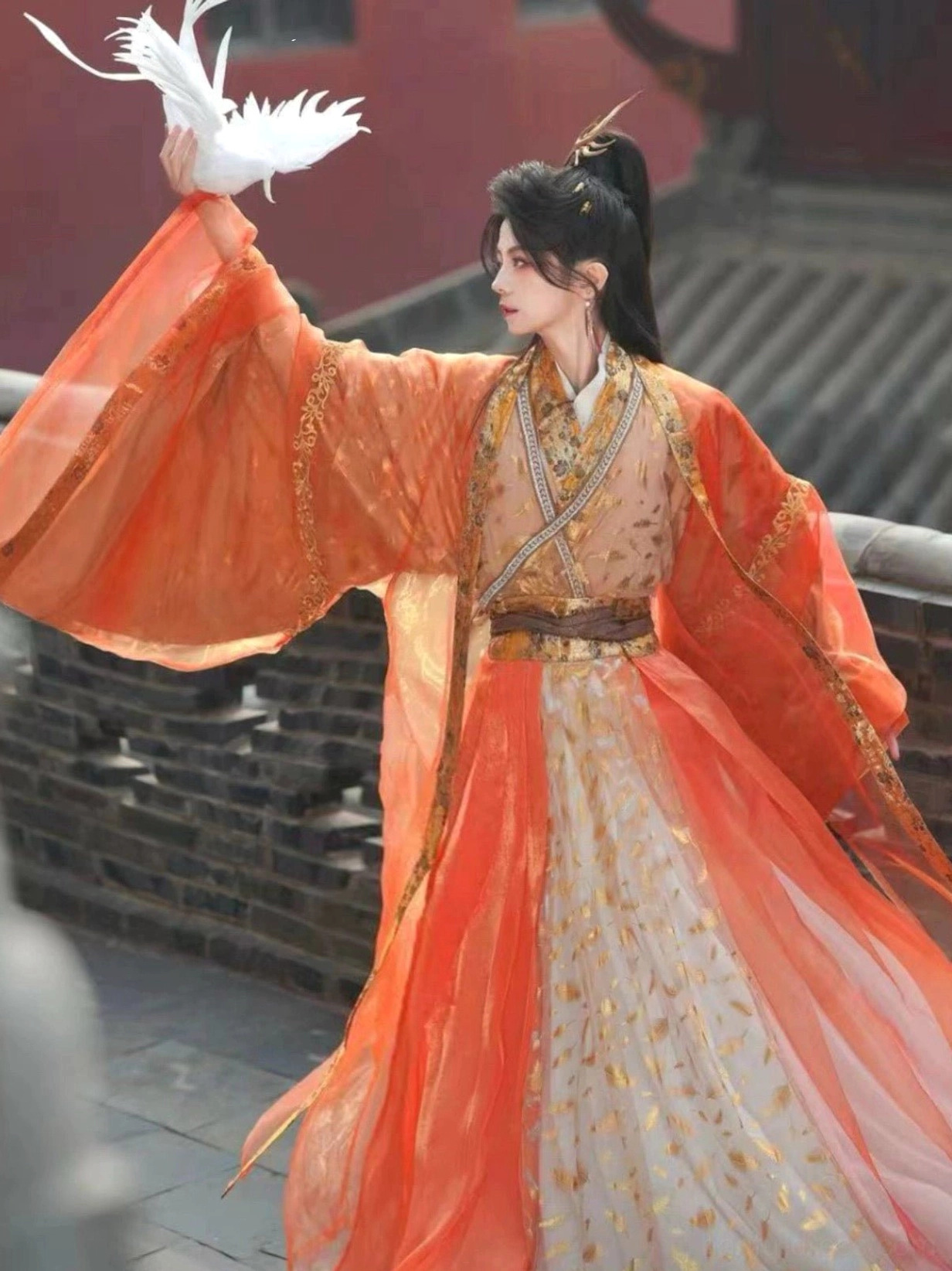 Side view of Radiance xianxia hanfu complete set with cross-collar layers, brown waist belt, orange pink gradient skirt, and white paper crane