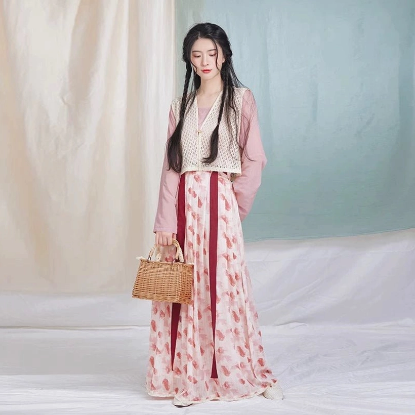 Full-length front styling of the complete raspberry Tang Dynasty hanfu set with dusty pink top, beige crochet beizi, and flowing printed skirt