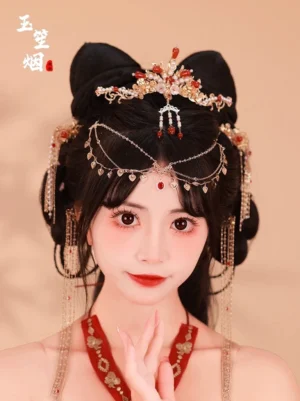 Model wearing a complete red cherry blossom Hanfu hair accessories set with gold-toned crown, red agate accents, faux pearl details, and heart-shaped forehead pendants