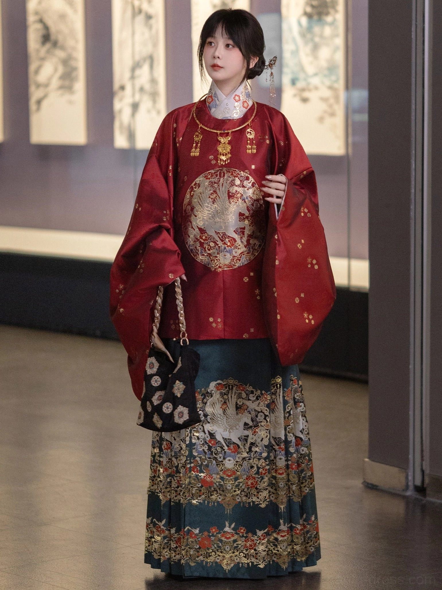Red crane round-collar Chinese New Year Hanfu top paired with dark teal embroidered mamian skirt full outfit