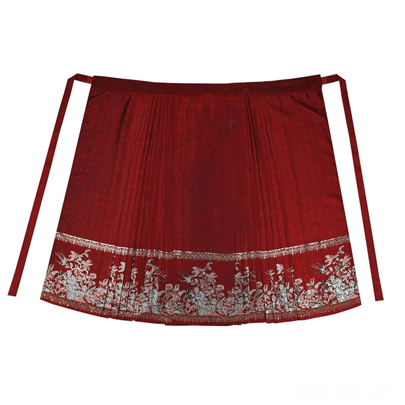 Red embroidered mamianqun horse face skirt flat lay with pleated sides floral hem and gold-tone border