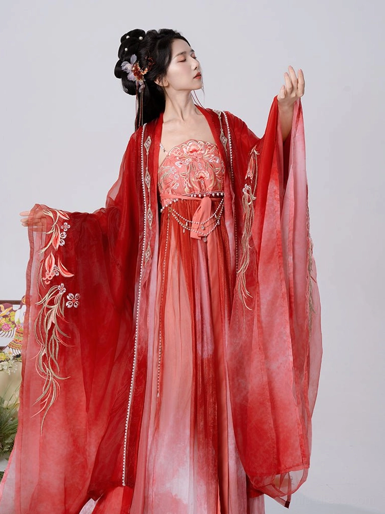 Red gradient Tang Dynasty Hanfu Heziqun dress shown from the side with golden floral and phoenix embroidery, wide sleeves, and embroidered camisole top