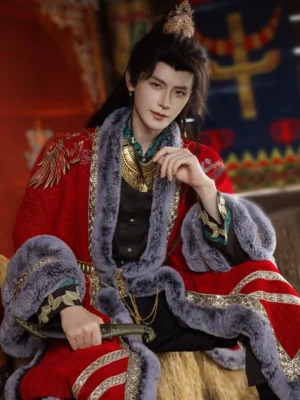 Close-up of a male model wearing a red hanfu overcoat with thick grey faux fur trim, ornate gold neck jewelry, and a decorative miniature sword