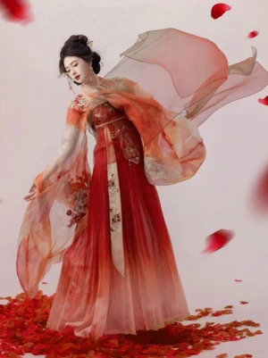 Side view of red and orange ombre Tang Dynasty Qixiong Ruqun Hanfu with floral embroidery, wide sheer sleeves, and flowing shawl