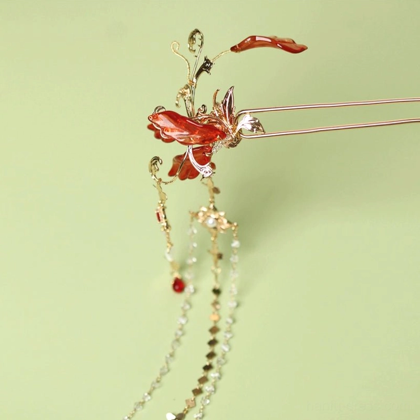 Left-oriented red spider lily Hanfu hair pin close-up with compact clear crystal tassels, red bead details, gilded metal finish, and floral centerpiece