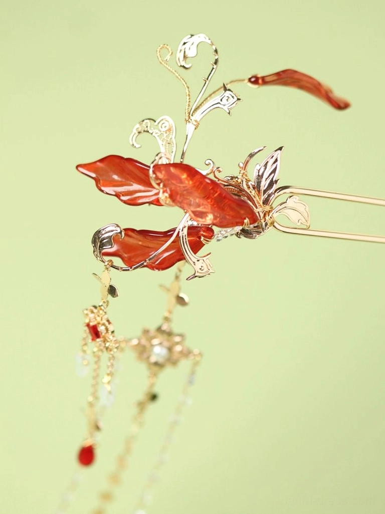 Right-side red spider lily Hanfu hair pin close-up with gold leaf accents, red petals, layered chain tassels, clear crystals, and red bead pendant