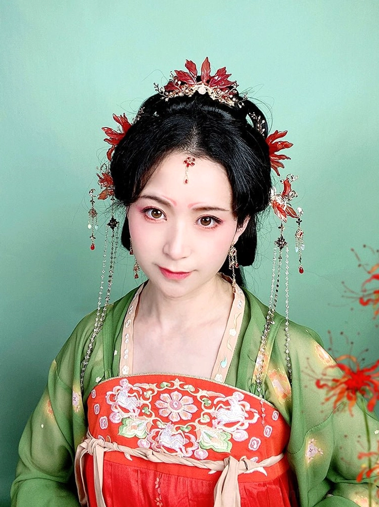 Model wearing red spider lily Hanfu hair pins with matching traditional Chinese hair ornaments, forehead jewelry, and tassel accessories in a Tang-style Hanfu look
