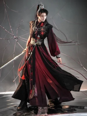 Full body male model wearing a black and wine red red spider lily Xianxia modern Hanfu costume with layered robes, embroidered vest, martial arts sword, and spider web fantasy studio backdrop