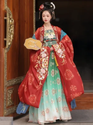 Red Tang Dynasty style Qixiong Ruqun Hanfu with floral wide-sleeved coat, green white gradient skirt, embroidered bust top, and palace fan