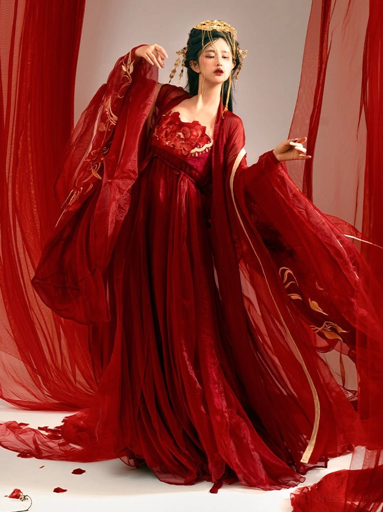 Full front view of a red Tang style Hanfu Heziqun wedding dress with golden robe trim, floral appliqué bodice, elegant floor-length skirt, and traditional bridal headwear