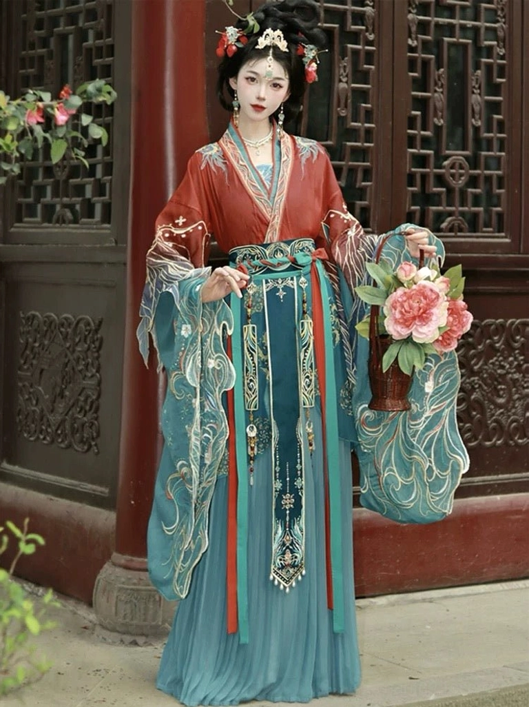 Red and teal Qiyao Ruqun Hanfu inspired by Wei Jin Dynasty fashion, shown with embroidered wide sleeves, pleated skirt, floral hair ornaments, and a peony flower basket