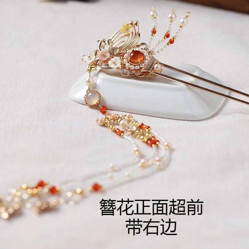 Right side wear phoenix Chinese hair stick displayed with gold tone bird ornament red stone white beads and long tassel chain