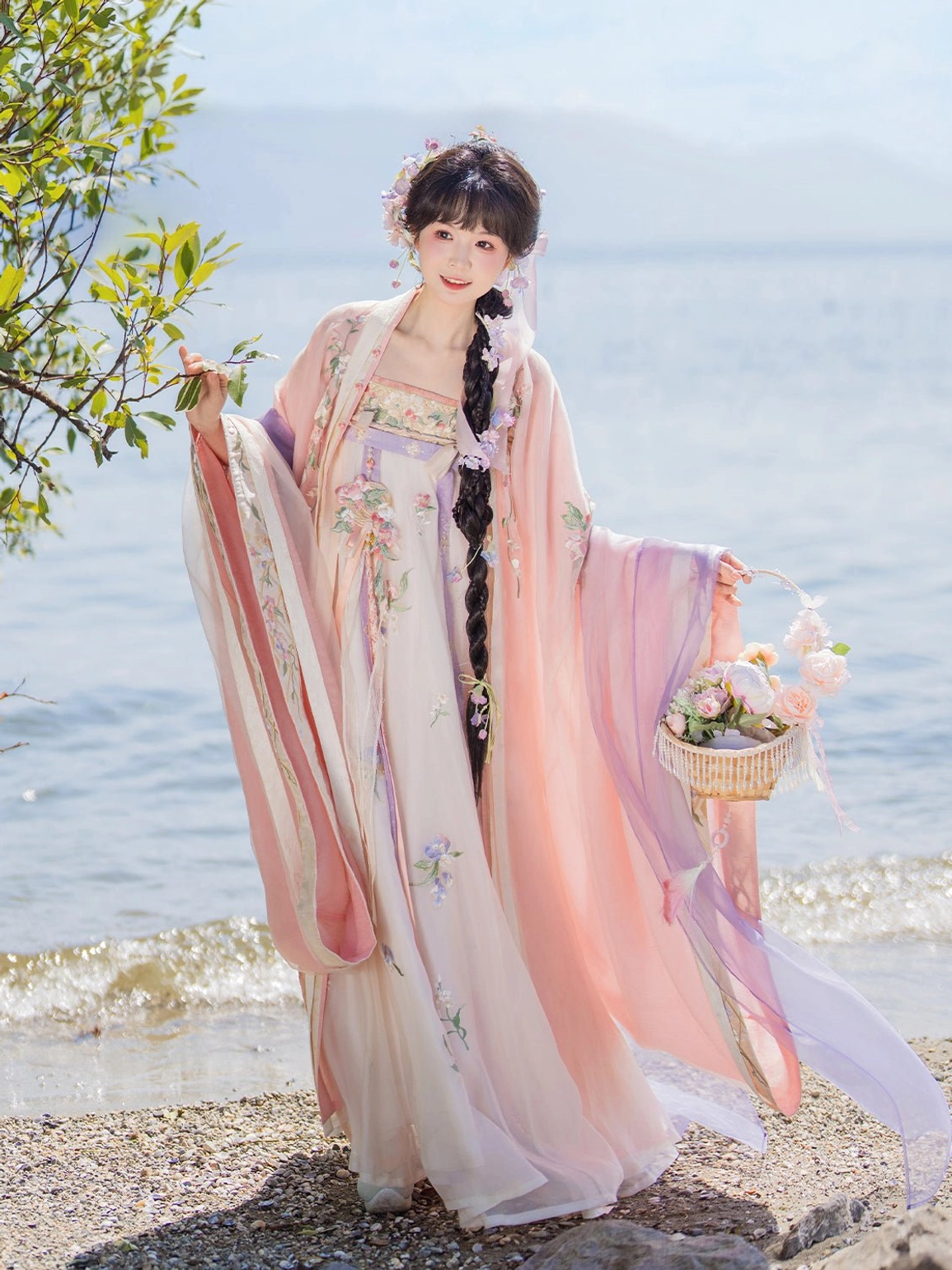 Romantic Tang Dynasty Qixiong Ruqun hanfu set with floral embroidery, pastel wide sleeves, and flower hair accessories