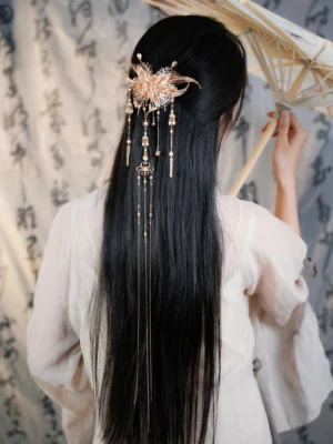 Rose gold butterfly tassel back hair pin worn on long black hair with Hanfu and a traditional Chinese paper umbrella