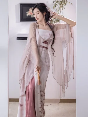 Rouge Snow modern Song Dynasty Hanfu full set worn in front view with dusty rose sheer cardigan, camisole, ink wash floral wrap skirt, and folding fan