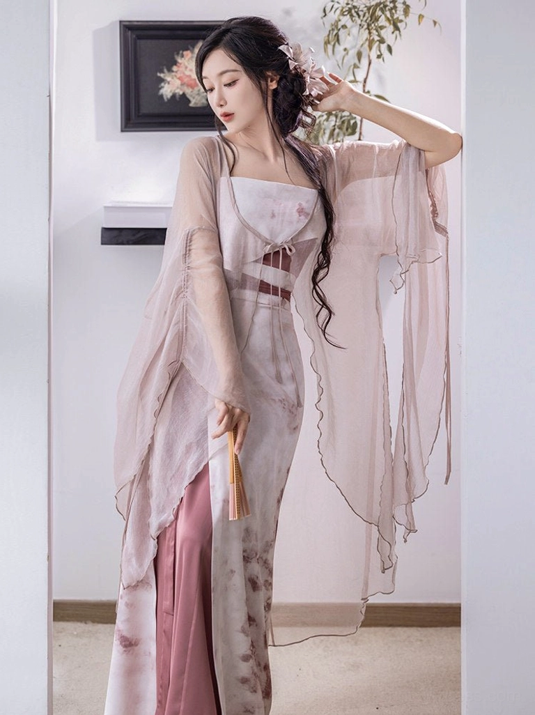Rouge Snow modern Song Dynasty Hanfu full set worn in front view with dusty rose sheer cardigan, camisole, ink wash floral wrap skirt, and folding fan