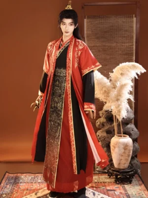 Red royal hanfu for men with gold embroidered trim, black inner robe and ornate waist sash in Chinese fantasy period drama style