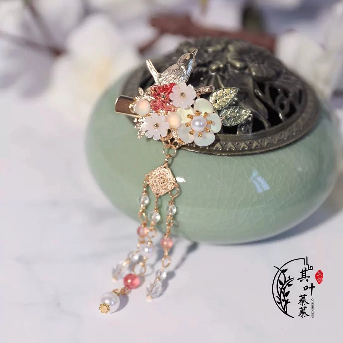Ruyao floral bird Hanfu hair clip with gold filigree pink white bead tassel and pearl ornament close up