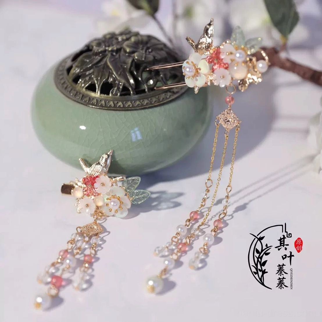 Ruyao floral bird Hanfu hairpin and matching tassel hair clip set with pink white blossoms pearl beads and gold details flat lay
