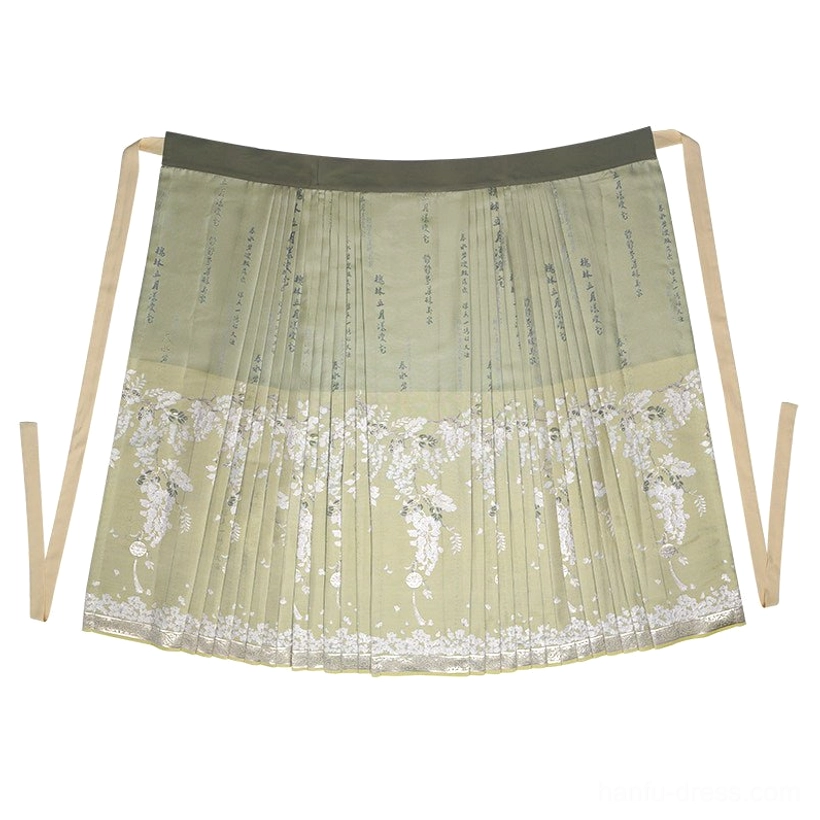 Sage green Ming-style mamianqun maxi skirt with pleats, waist tying sashes, acacia flower artwork, and traditional calligraphy details