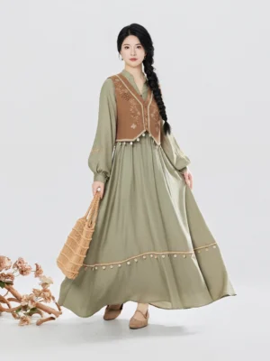 Sage green modern Hanfu lantern sleeve maxi dress with brown floral embroidered vest shown in a full front studio view
