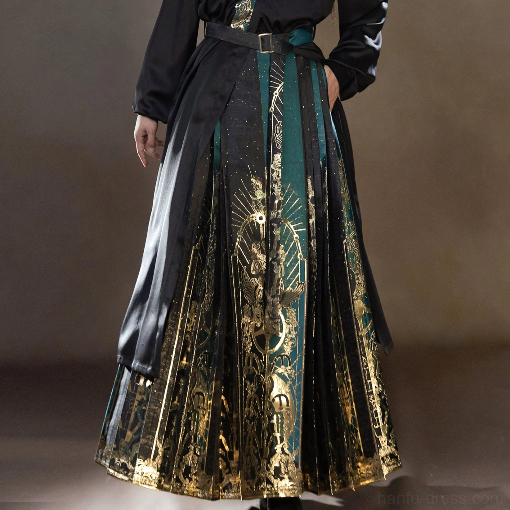 Sanxingdui modern Hanfu outfit product image featuring a dark green and gold mamianqun horse face skirt with traditional Chinese inspired patterns