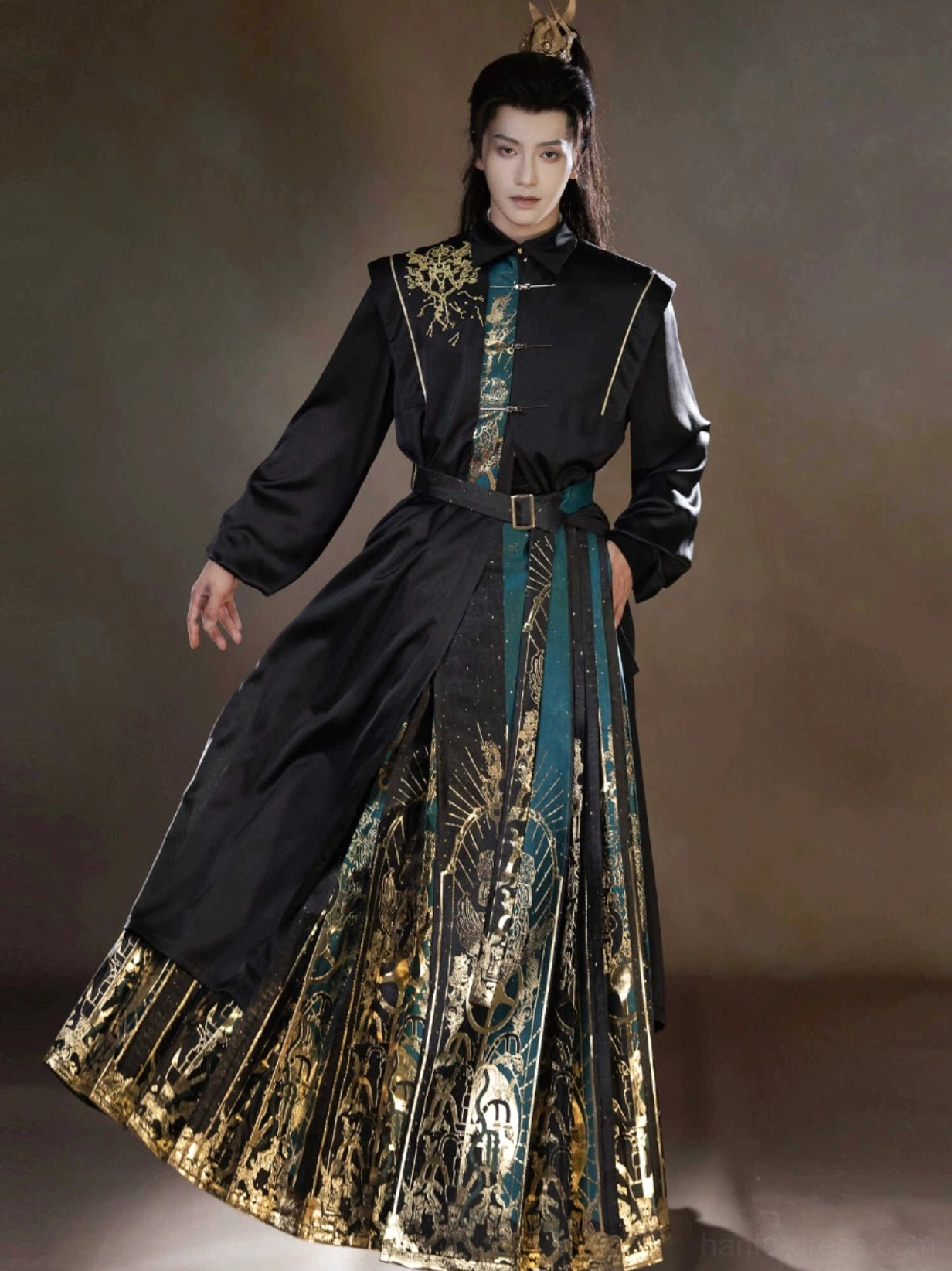 Front view of a Sanxingdui inspired modern Hanfu outfit with black stand collar robe, dark green and gold mamianqun horse face skirt, waist belt, and traditional Chinese styling